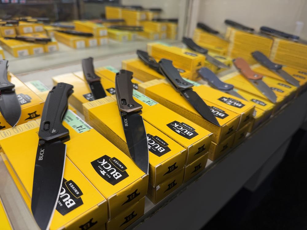 Buck knives in a glass case