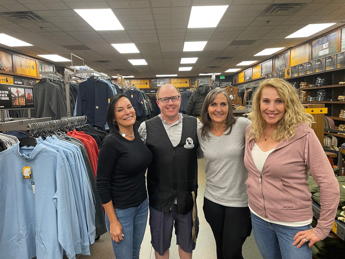 Black Sheep team members in the new Carhartt showroom at the Silver Lake Mall.