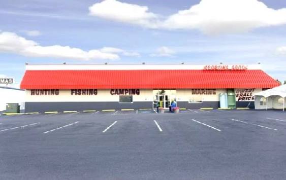 Black Sheep Sporting Goods store at 308 W. Seale Ave., with a red awning and Hunting, Fishing, Camping and Marine signs.